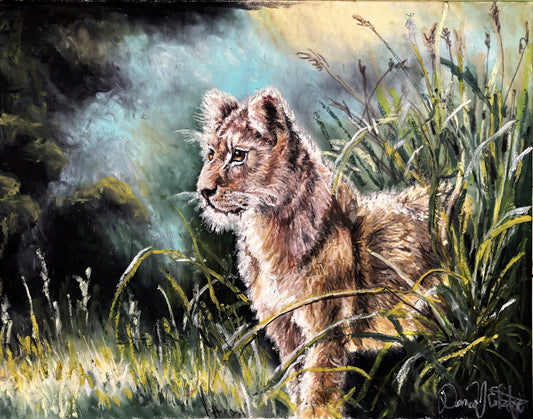 Lion Cub in the Grass
